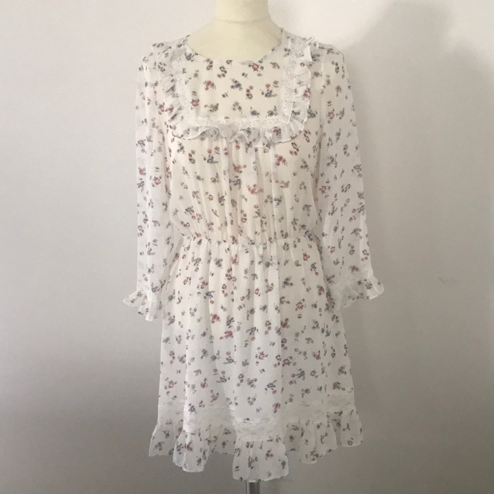 Print ruffled mini flower dress.